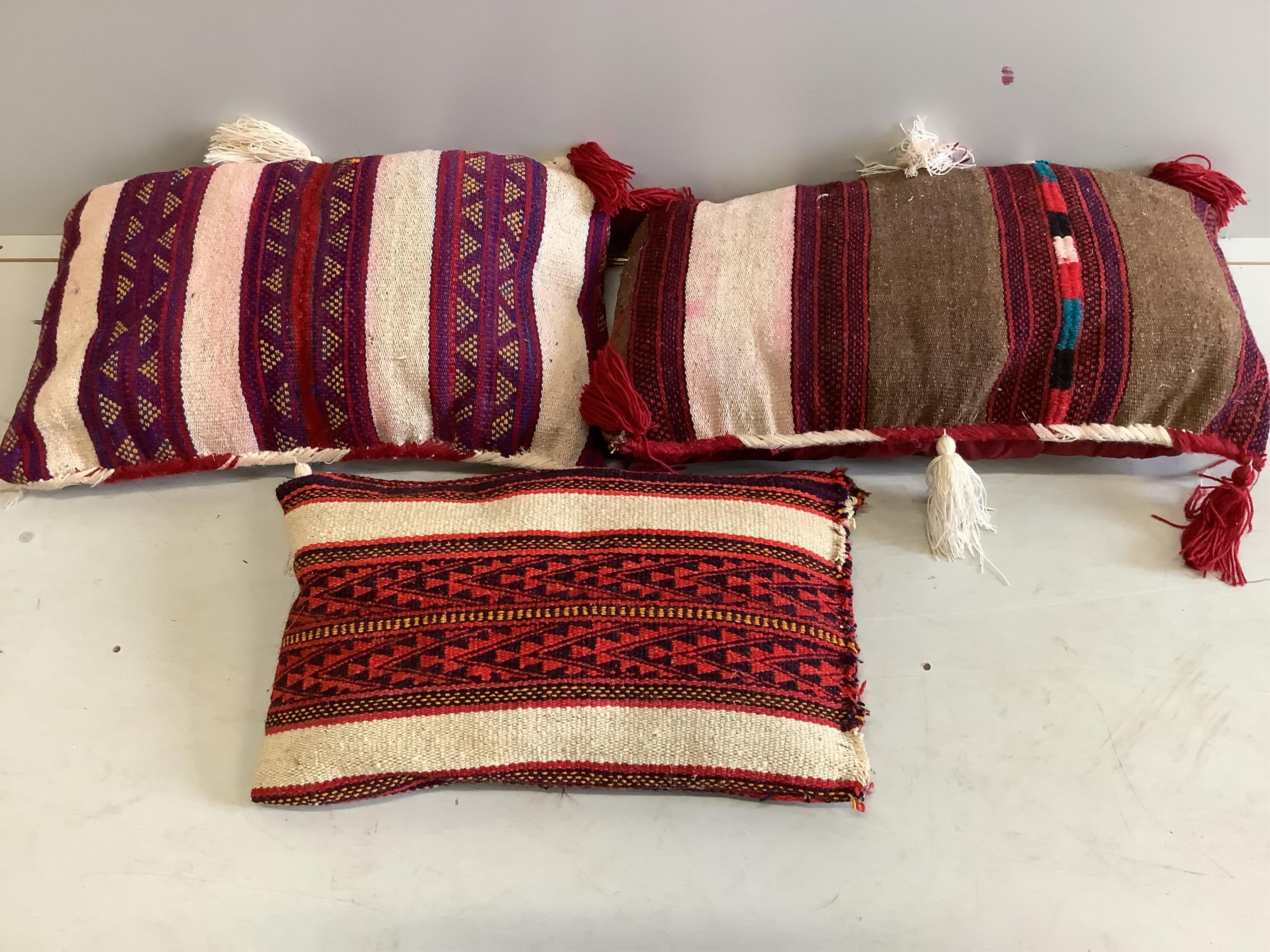 Three rectangular Kilim cushions, largest 70 x 42cm. Condition - good